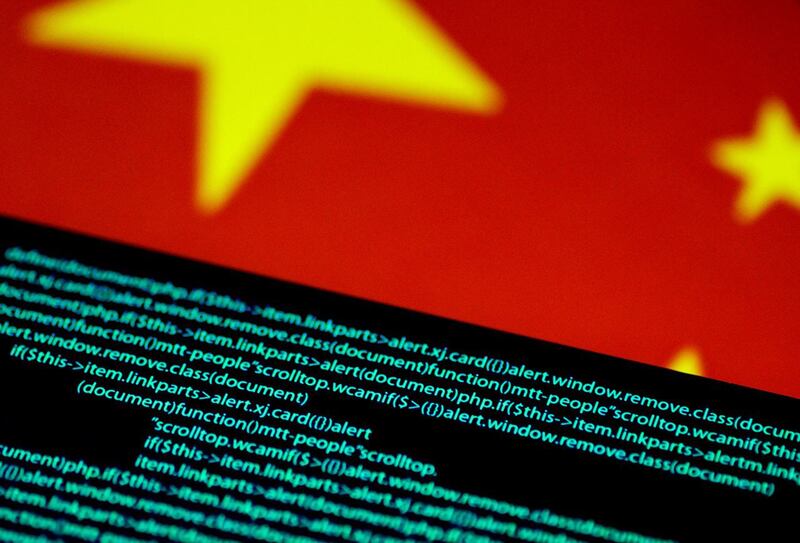 中国国旗与计算机代码(路透社资料图片)