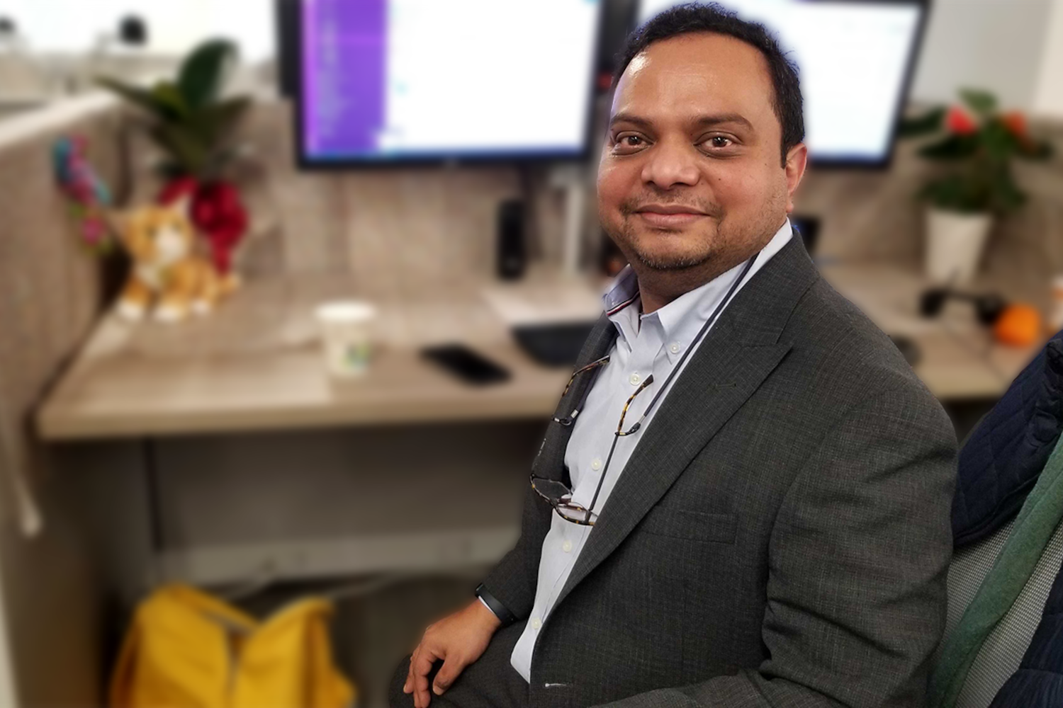 Bangladeshi journalist Ashif Entaz Rabi sits at his desk in the BenarNews newsroom in Washington, D.C., Feb. 2, 2024.