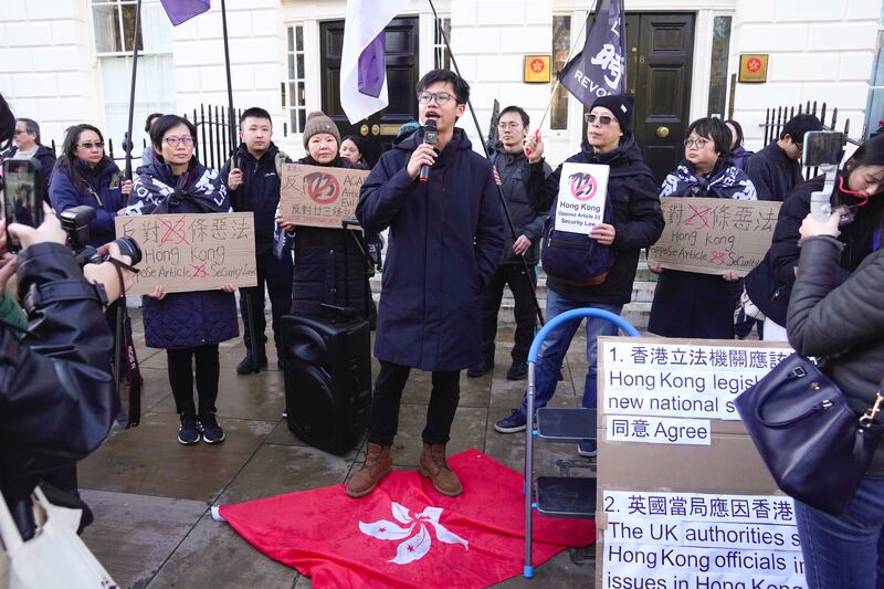 Hong Kong activist Tony Chung takes part in a protest, against Hong Kong's new national security law, the Basic Law Article 23, recently approved by Hong Kong lawmakers, in London, March 23, 2024.