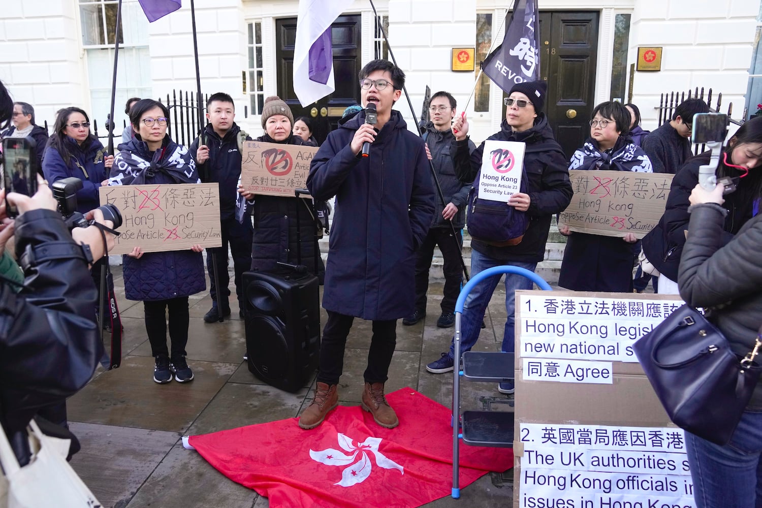 Hong Kong activist Tony Chung takes part in a protest, against Hong Kong's new national security law, the Basic Law Article 23, recently approved by Hong Kong lawmakers, in London, March 23, 2024.