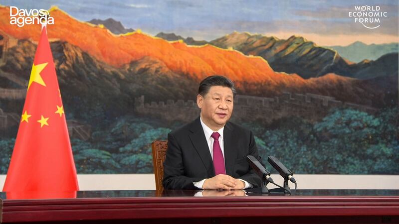 2021年1月25日,习近平在北京以视频方式出席世界经济论坛“达沃斯议程”对话会并致词(AFP)