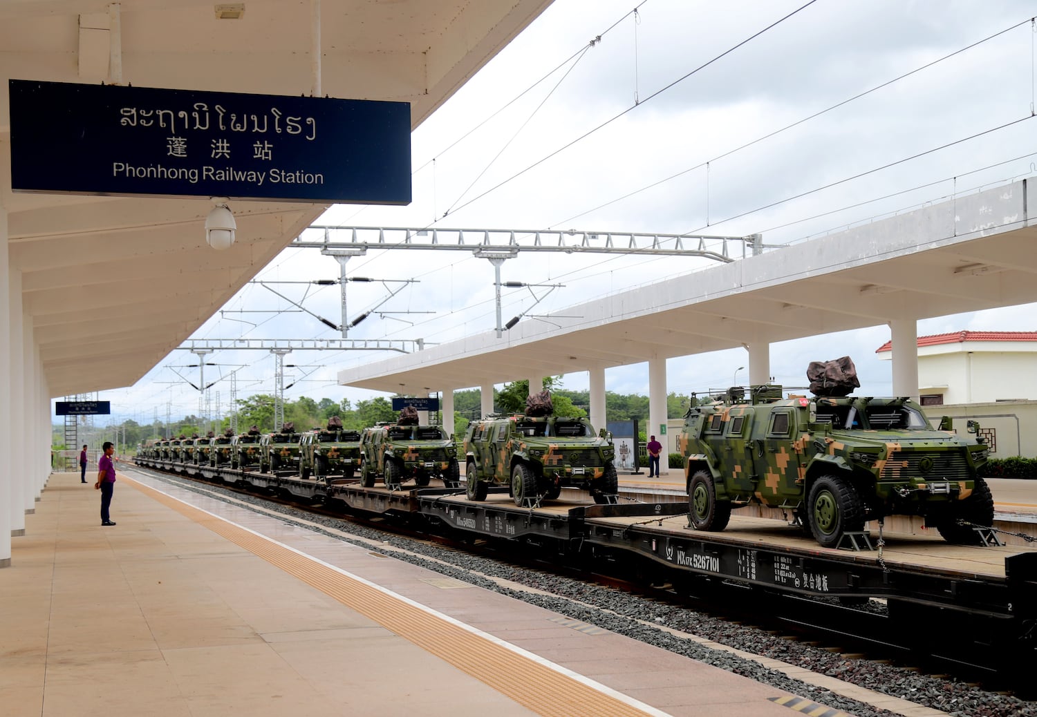 This image released by Chinese government media shows military vehicles at Phonhong Railway Station in Phonhong, central Laos' Vientiane Province, July 1, 2024.