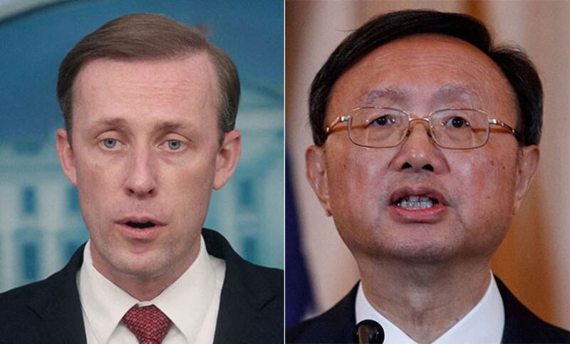 美国国家安全顾问沙利文(左)与中共中央政治局委员杨洁篪。( 路透社/美联社)