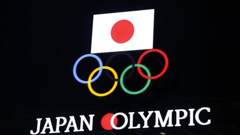 日本东京奥运遇上疫情，政府债台高筑，可能导致政治危机。学者认为日本对美对中的外交力量可能降低。(法新社)