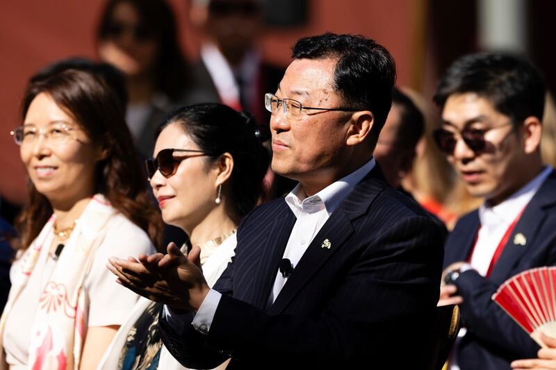 Chinese Ambassador to the United States Xie Feng claps during the grand opening ceremony for Panda Ridge at the San Diego Zoo, Aug. 8, 2024.