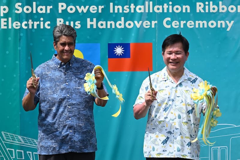 Palau President Surangel S. Whipps Jr. Taiwan's Foreign Minister Lin Chia-lung during the inauguration ceremony for Taiwan-funded solar energy and electric bus projects in Koror, Aug. 30, 2026, ahead of the 55th Pacific Islands Forum Leaders Meeting.