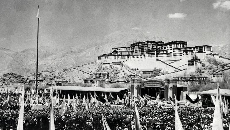 Tibetans gather during the armed uprising against Chinese rule March 10, 1959 in front of the Potala Palace in Lhasa, the capital of Tibet.