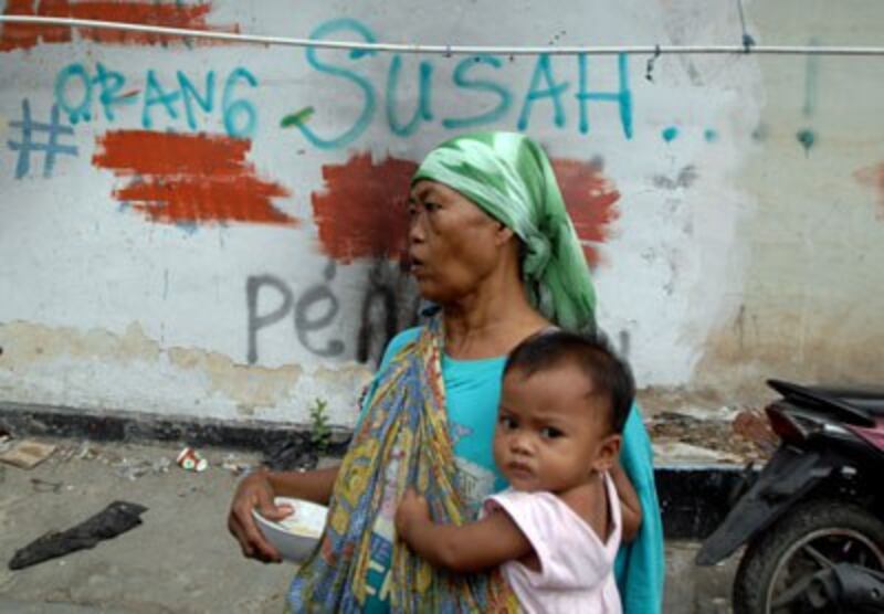 Người nghèo trong khu vực tồi tàn ở Jakarta chụp hôm 3 tháng 1 năm 2017.