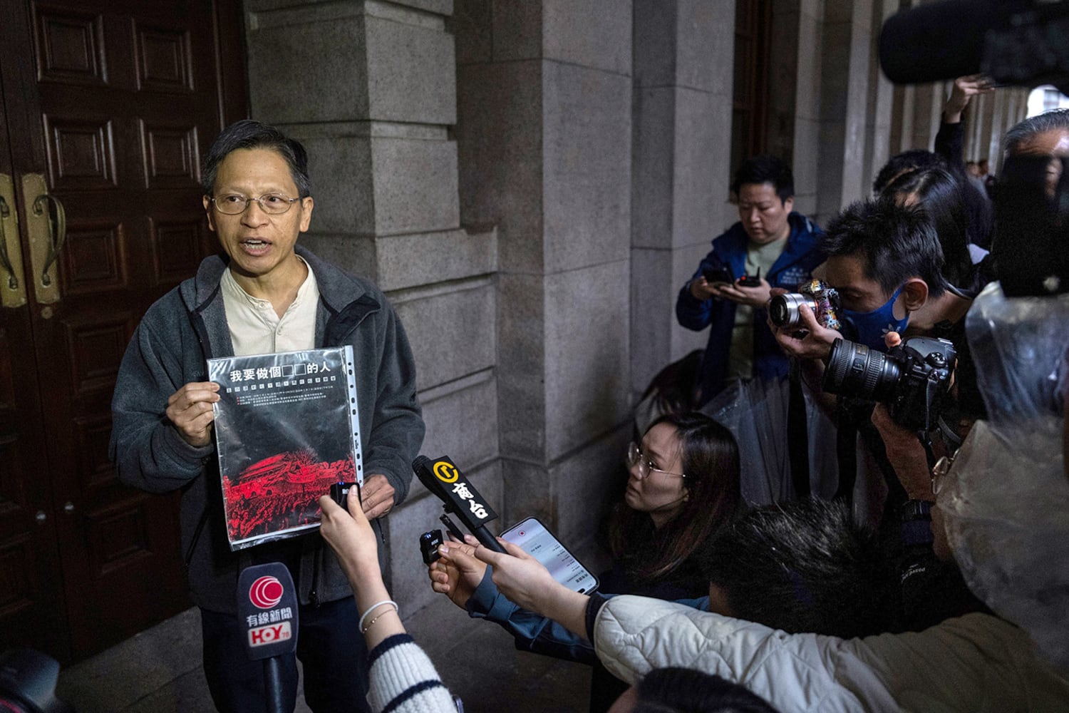 Hong Kong court overturns Tiananmen vigil group convictions