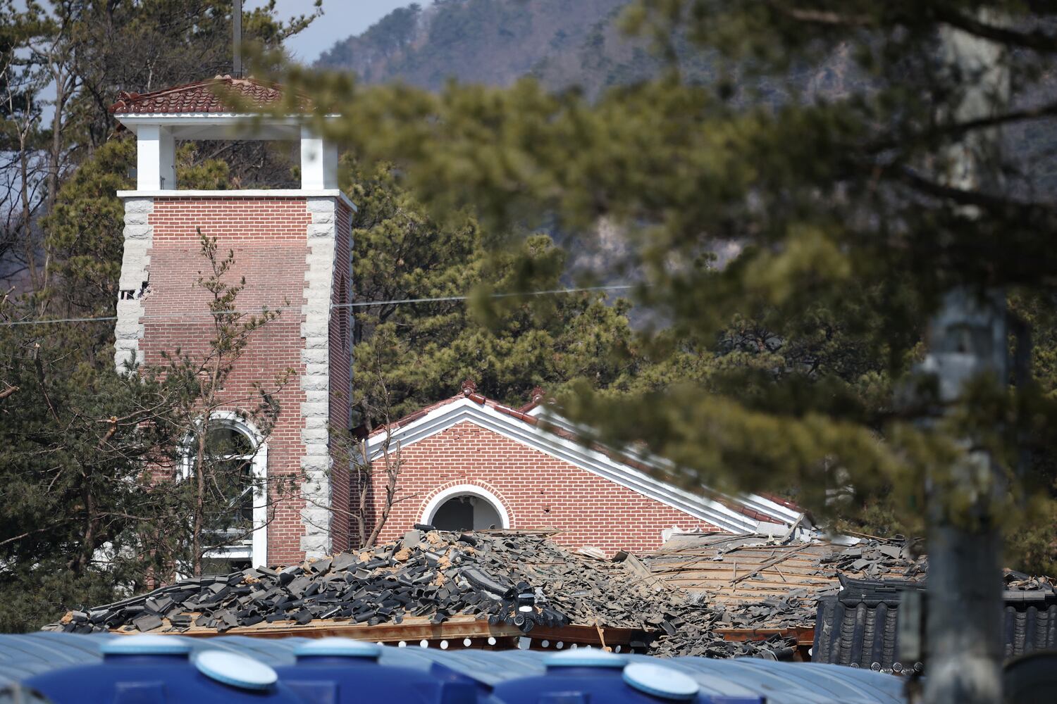 Debris lies at a damaged church after MK-82 bombs fell outside the shooting range during joint live-fire exercises near the demilitarized zone separating two Koreas in Pocheon, South Korea, March 6, 2025.