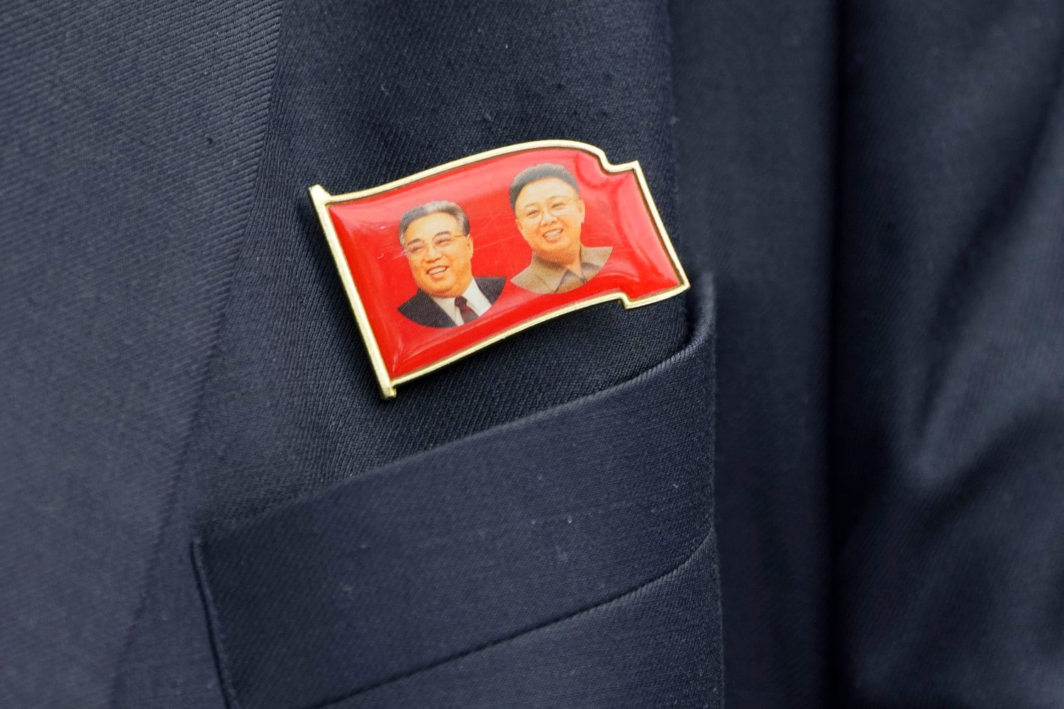 Once treasured lapel pins of North Korea’s former leaders now sell for cheap