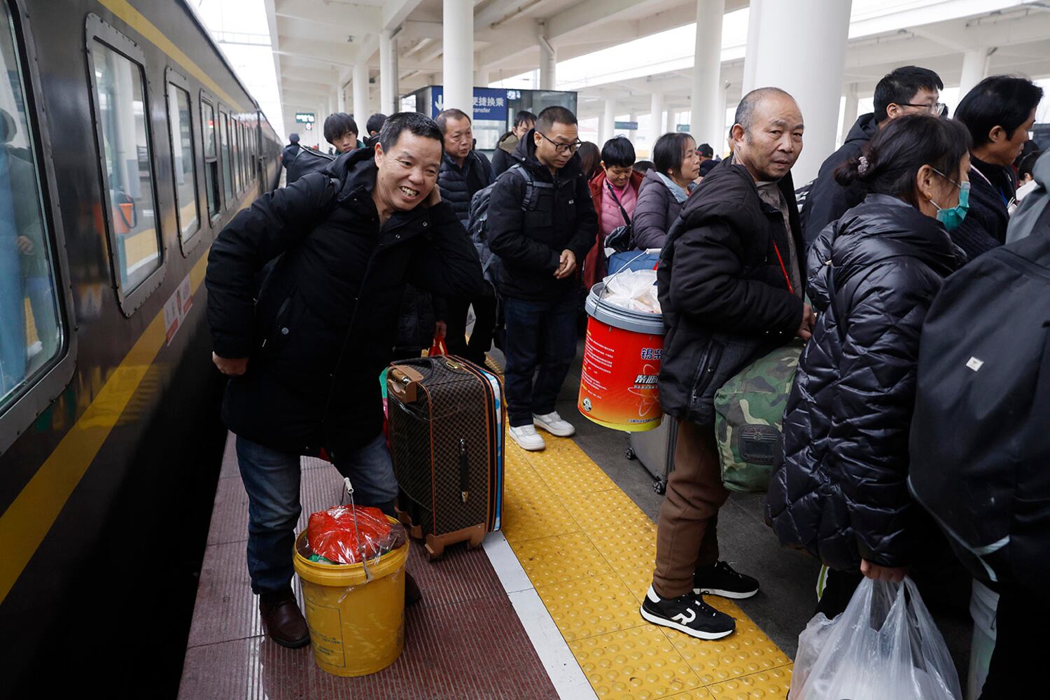 Cash-strapped Chinese take the slow train home for Lunar New Year