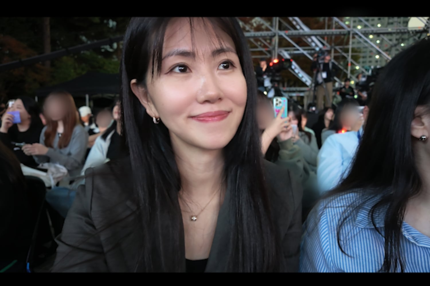 Cho Mi-young watches a live broadcast of KBS Music Bank at the National Museum of Korea in Seoul, Oct. 16, 2026.