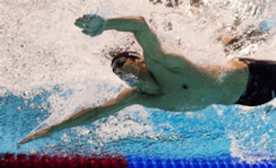 Michael Phelps lập kỷ lục thế giới người nhiều huy chương Olympics nhất. AFP photo.