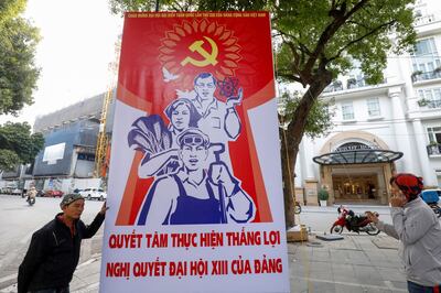 2021-01-12T112129Z_1203558454_RC2B6L9XUMQR_RTRMADP_3_VIETNAM-POLITICS-CONGRESS.JPG