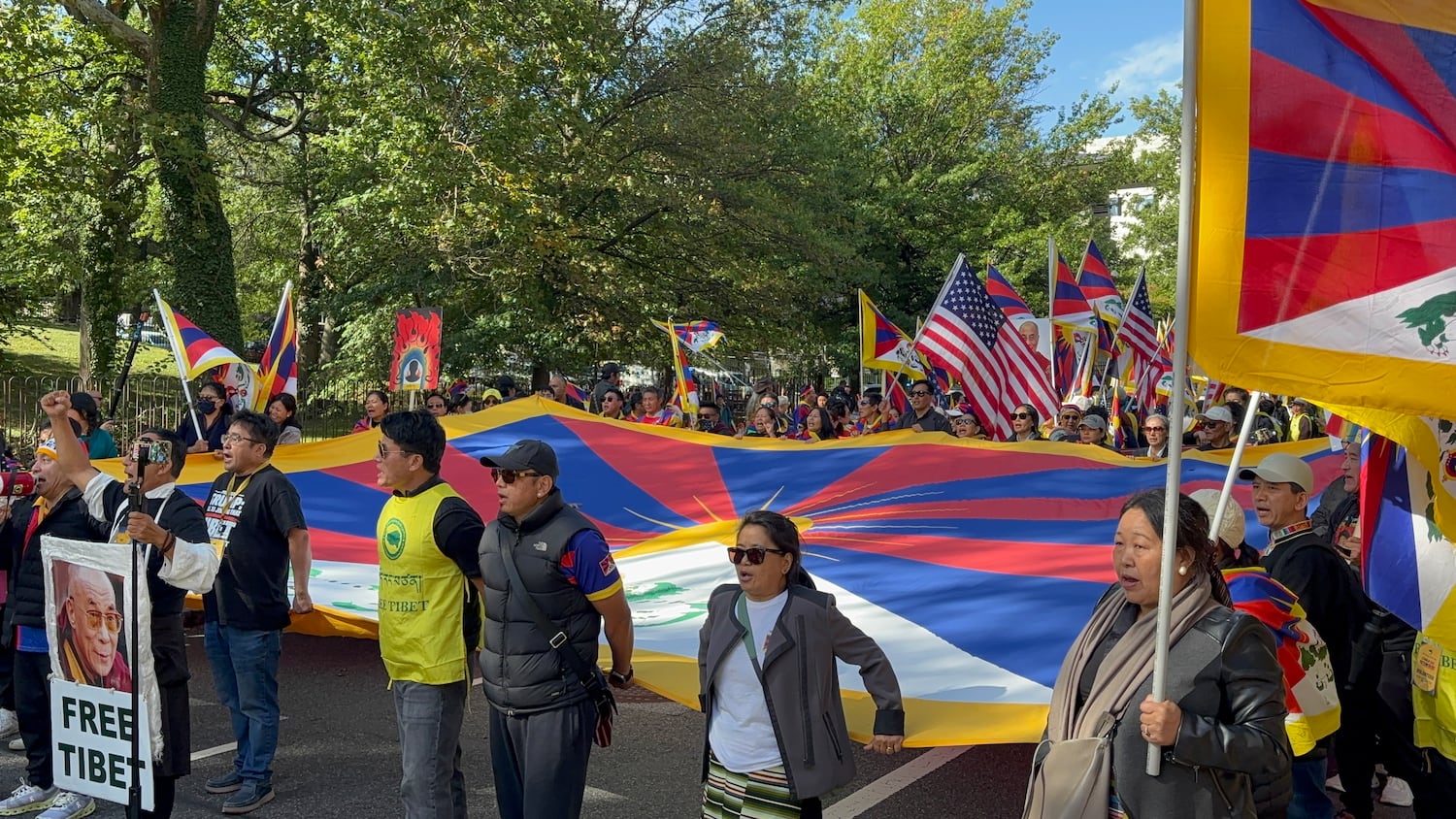 A Tibetan flag is carried during protest near the Chinese Embassy in Washington as Chinese President Xi Jinping meets with U.S. President Trump at the White House, Sept. 24, 2026.