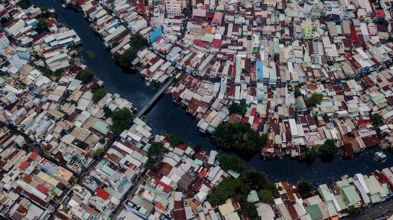 Houses along the Xuyen Tam canal in Ho Chi Minh City, Vietnam, in aerial photo taken on Oct. 19, 2018.