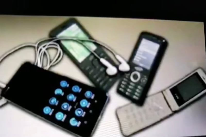 Footage of a North Korean educational propaganda video shows mobile phones confiscated from soldiers.