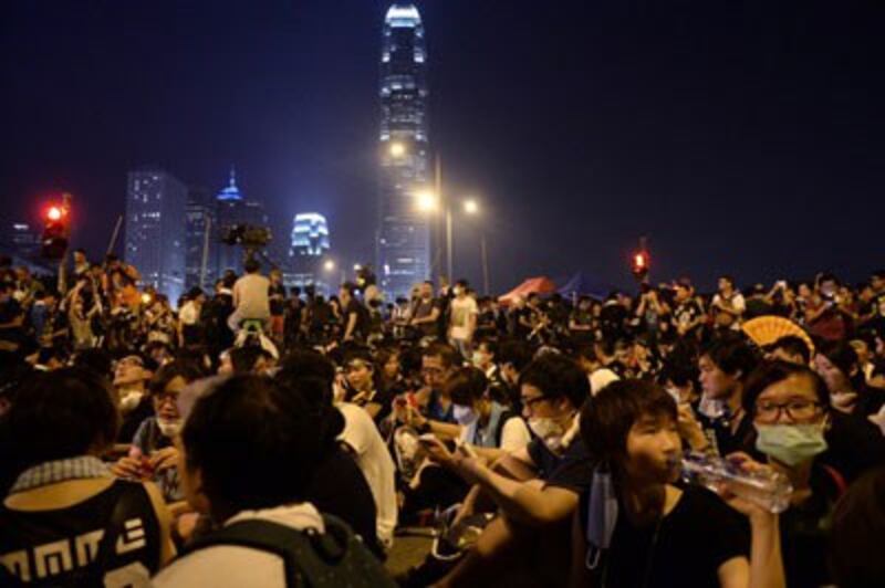 Pro-democracy demonstrators attend a protest near the Hong Kong government headquarters, Oct. 2, 2014. Credit: RFA