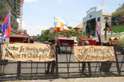 Người biểu tình kêu gọi công lý cho nhà hoạt động đất đai Chan Puthisak ngày 20/5/2014.Photo by Quoc Viet, RFA