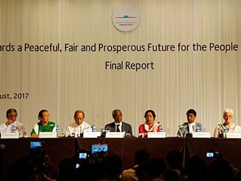 The members of the Advisory Commission on Rakhine State present their final report at a press conference in Yangon, Aug. 24, 2017.