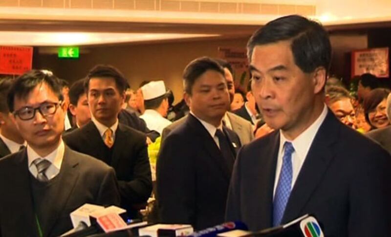 12月15日，香港行政長官梁振英表示，兩個多月的佔領行動告一段落，社會最大的損失是法治受到破壞。（現場人士攝）