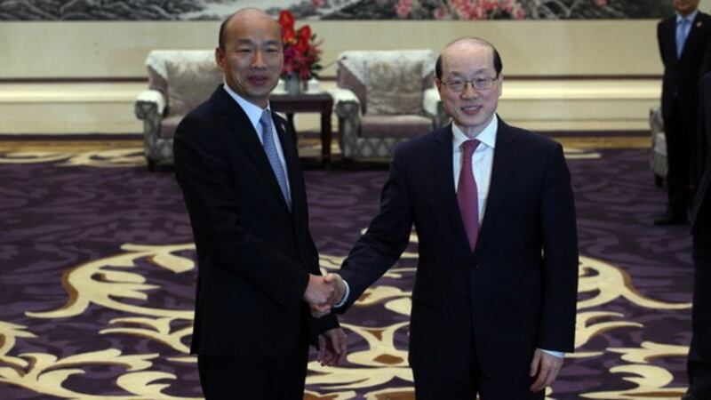 韩国瑜日前赴陆会国台办主任刘结一。（高雄市政府提供）