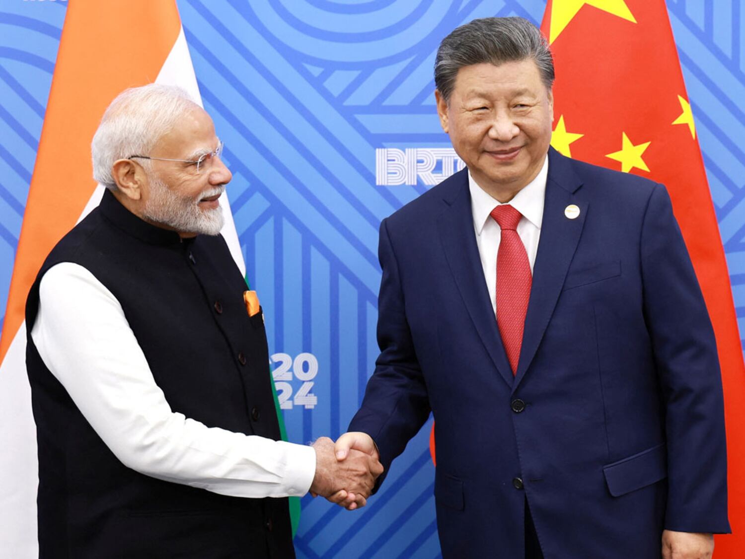 Chinese President Xi Jinping (right) meets with Indian Prime Minister Narendra Modi at the BRICS summit in Kazan, Russia, Oct. 23, 2024.