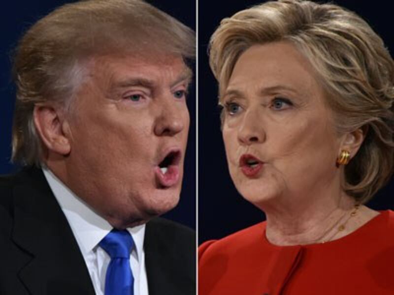 Hai ứng cử viên của hai đảng chính là cựu Ngoại trưởng Hillary Clinton bên đảng Dân Chủ (phải) và doanh gia Donald Trump bên đảng Cộng Hòa. AFP PHOTO.