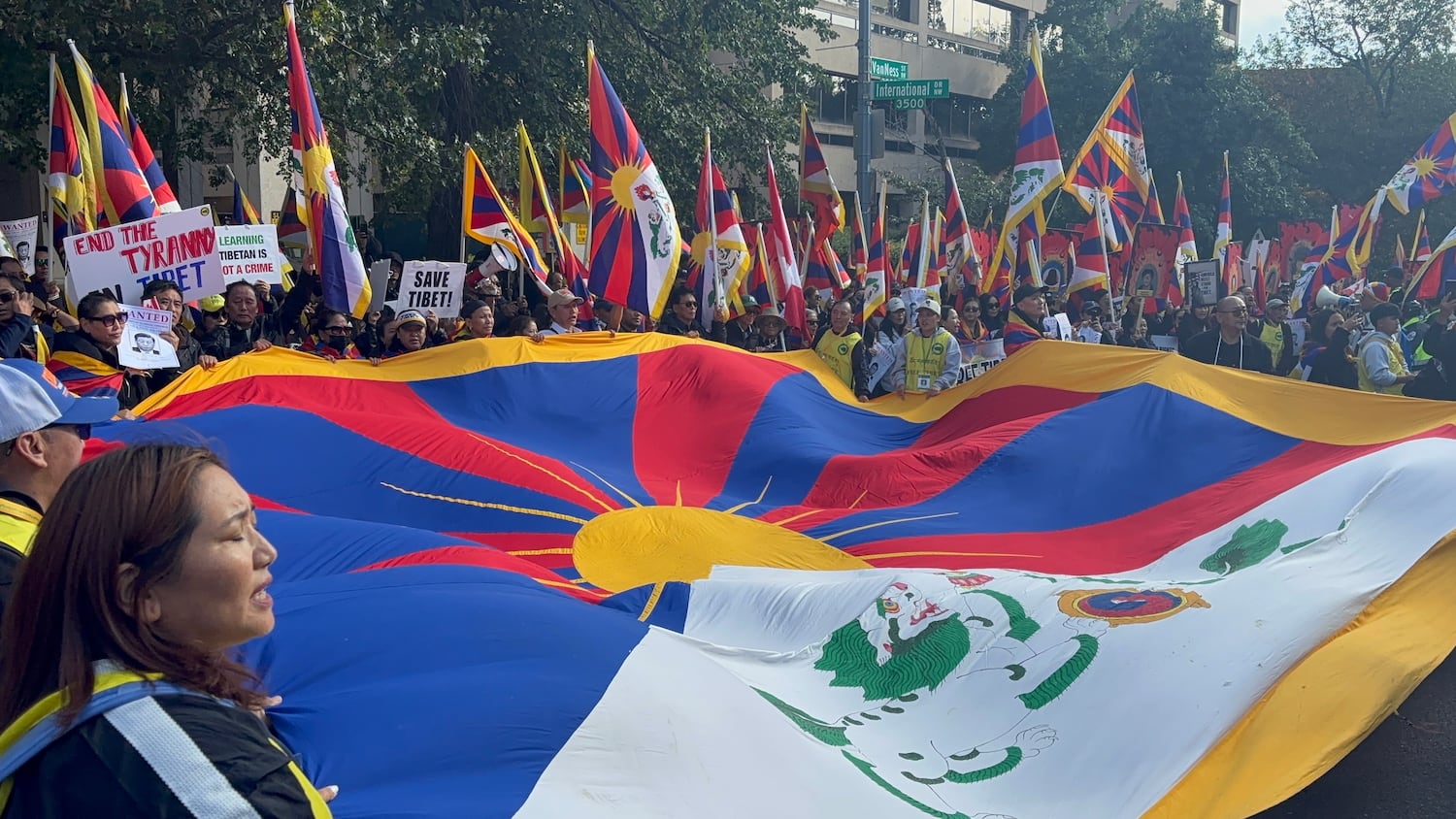 A large Tibetan flag is carried near the Chinese Embassy in Washington as Chinese President Xi Jinping meets with U.S. President Trump at the White House, Sept. 24, 2026.
