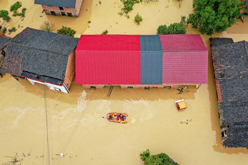 2024年7月28日，湖南省资兴市因受台风"格美"影响普降大雨发生洪灾。(法新社)