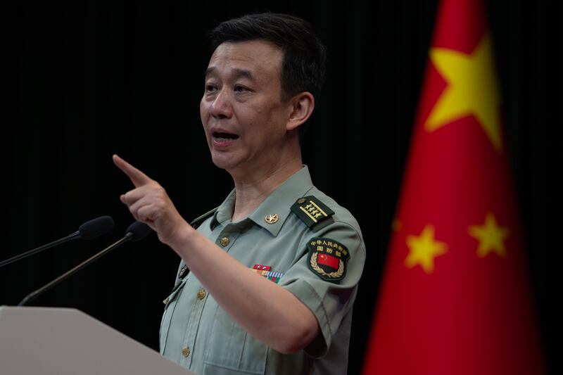 Chinese Defense Ministry spokesperson Wu Qian speaks during a press conference in Beijing, Thursday, May 30, 2024. (AP Photo/Ng Han Guan)