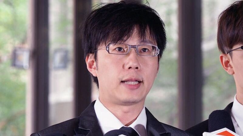 罢韩领衔人陈冠荣代为宣读“罢韩”五大理由。(记者 黄春梅摄)