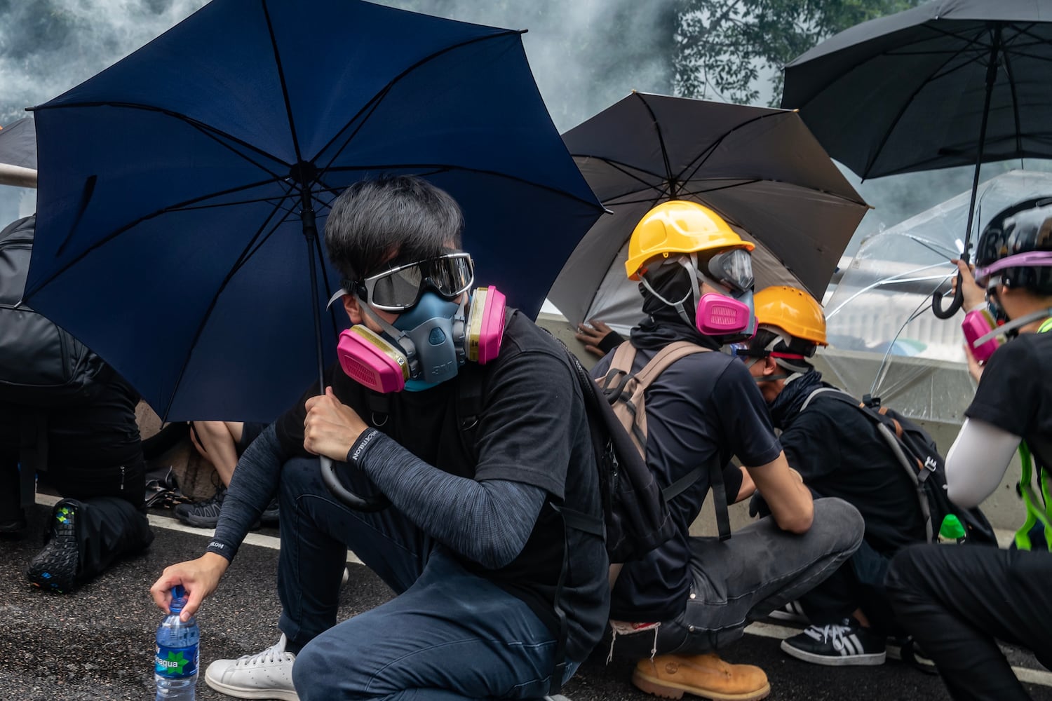 Protesters standoff with police in cloud of tear gas during a clash at an anti-government rally outside of Central Government Complex on August 31, 2019 in Hong Kong.
