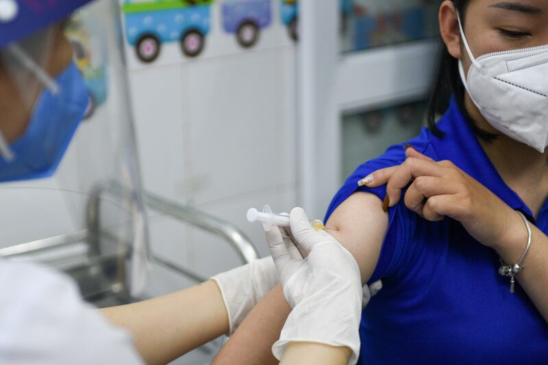 2021-07-14T102346Z_1309043173_RC2AKO92FDPK_RTRMADP_3_HEALTH-CORONAVIRUS-VIETNAM.JPG