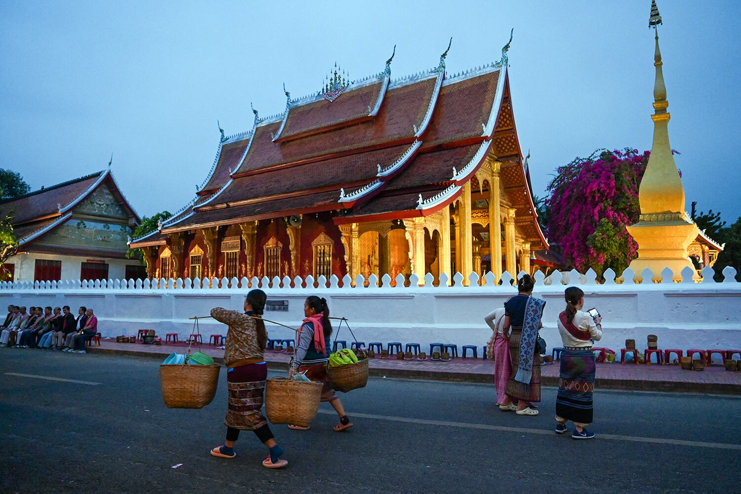 Lao officials charge hefty fees for photographers in tourism hotspot Luang Prabang