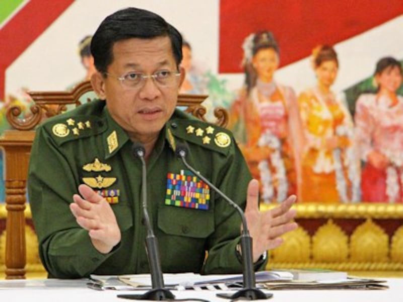 Myanmar's army chief General Min Aung Hlaing addresses reporters during an interview with local and international media in Naypyidaw, Sept. 21, 2015.