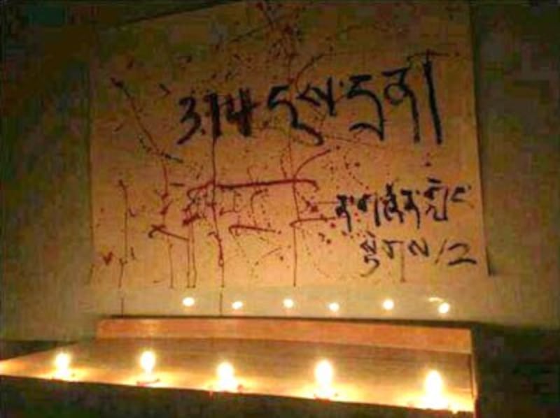Prayer lamps displayed by students on March 14, 2013 honor Tibetans who died in the Lhasa riot five years earlier. Credit: RFA listener