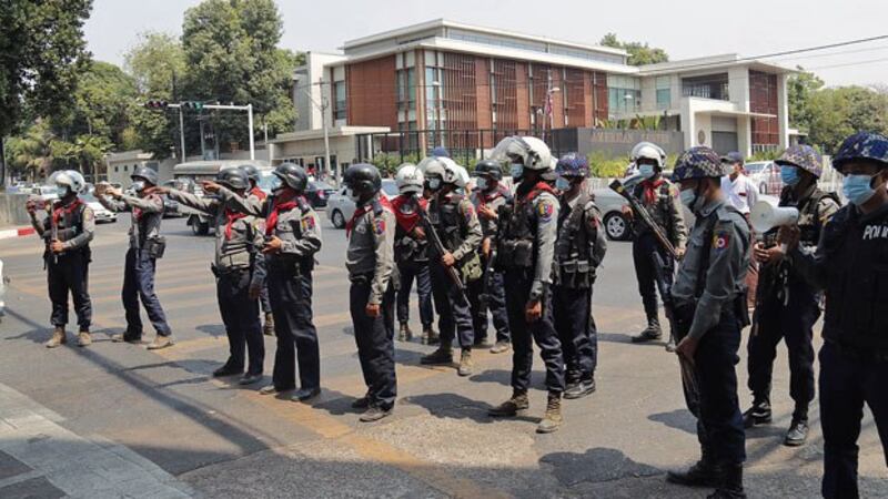 myanmar-police-patrol-street-us-embassy-yangon-feb23-2021.jpg