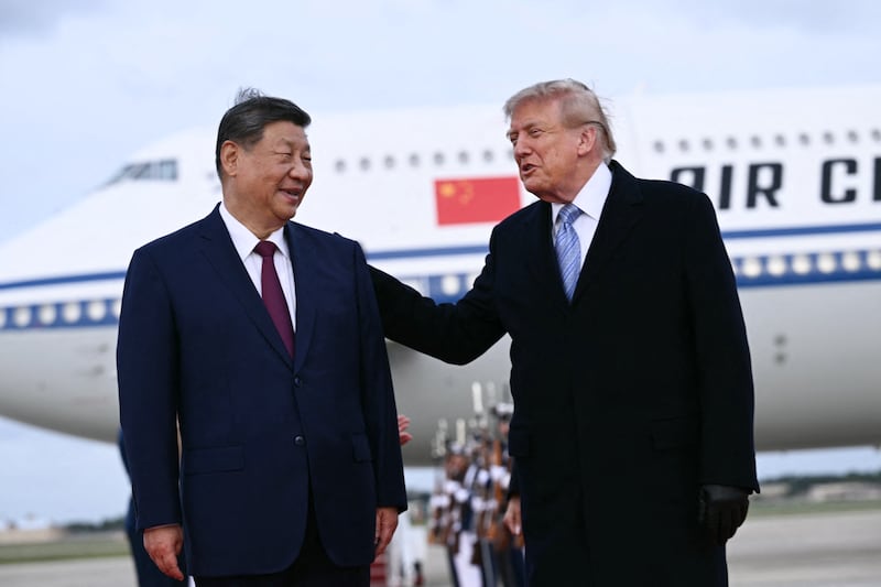 U.S. President Donald Trump greets Chinese President Xi Jinping upon his arrival at Joint Base Andrews in Maryland on Sept. 23, 2026.