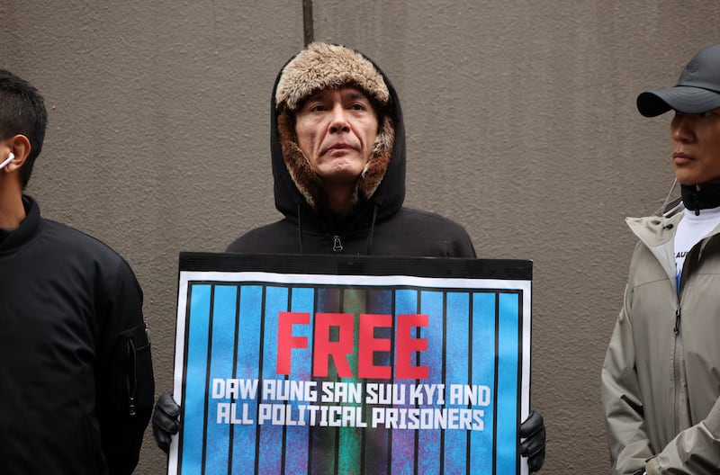 Kim Aris, the son of Aung San Suu Kyi, takes part in a protest denouncing an upcoming election led by the military junta and demanding the immediate release of Myanmar's detained former leader Aung San Suu Kyi and all political prisoners, in Tokyo, Dec. 14, 2025.