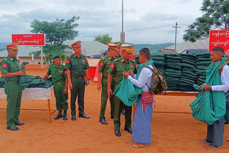 Recruits set to attend Military Service Training Course No. 26 at a training school under the Triangle Region Command collecting their military gear.