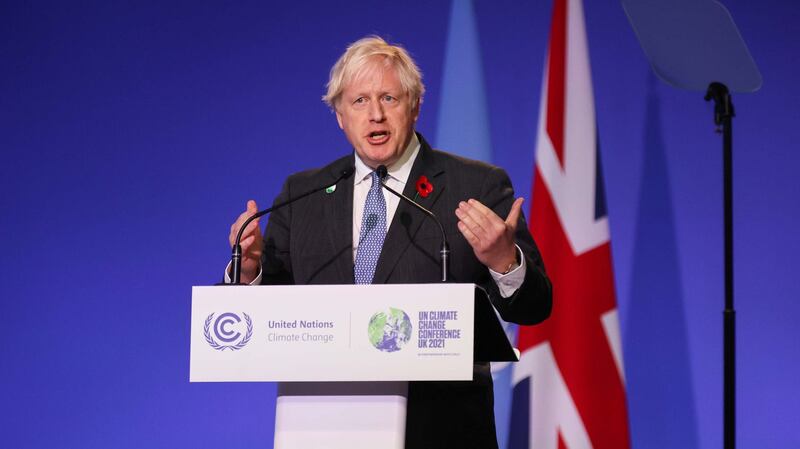 英国首相约翰逊在气候峰会呼吁加速淘汰燃煤，日前他也跟中国领导人习近平通话，要求加快脱煤步伐。（路透社）