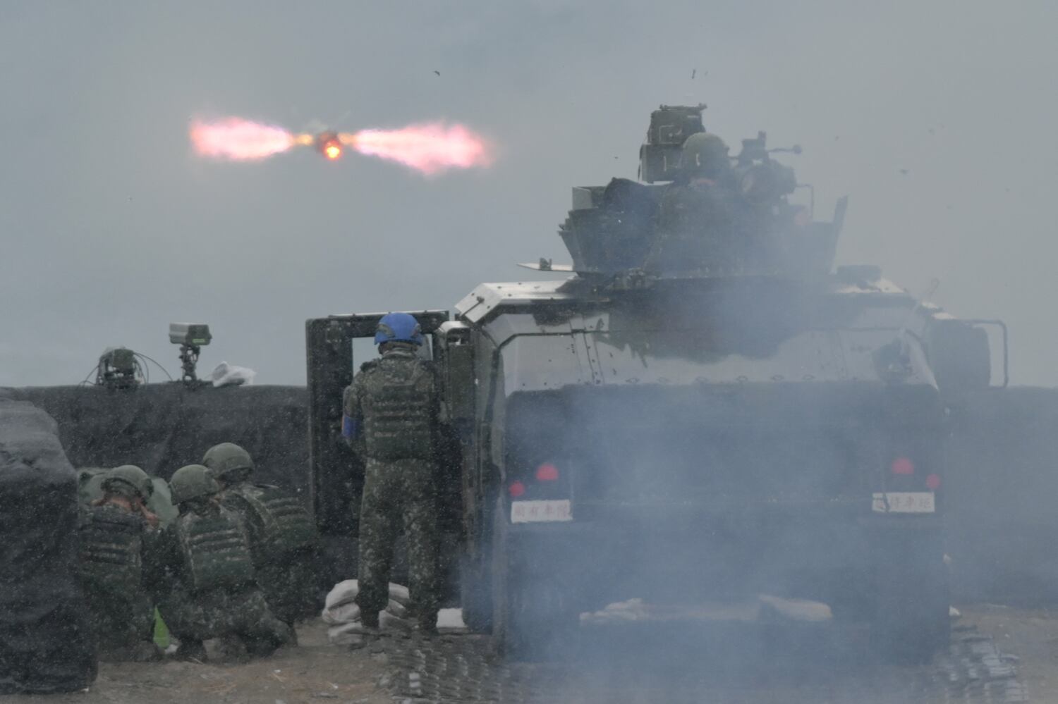 Taiwanese soldiers launch a U.S.-made TOW-2A wire-guided anti-tank missile during a live fire exercise at the Fanshan training grounds in Pingtung county on Aug. 26, 2024.