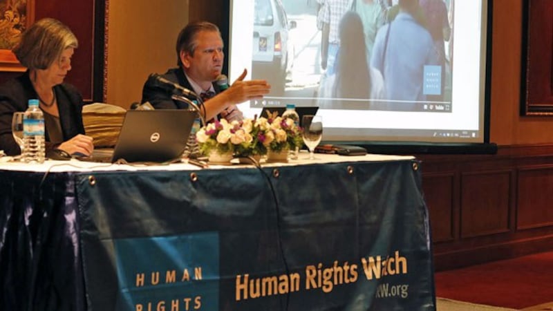 Linda Lakhdhir (L), Asia legal advisor for Human Rights Watch, and Phil Robertson (R), deputy director of the group's Asia division, hold a press conference in Myanmar's commercial hub Yangon, Feb. 1, 2019.