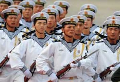 Hải quân Trung Quốc trong buổi lễ chào mừng tổng thống Brazil Luiz Inácio Lula da Silva ghé thăm Bắc Kinh ngày 19/05/2009. AFP PHOTO / Frederic J. BROWN.