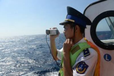 Một sĩ quan bảo vệ bờ biển Việt Nam trên Biển Đông hôm 14/5/2014. AFP photo
