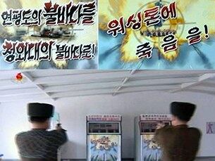 조선중앙TV는 11일 북한 인민내무군 군인들이 '연평도의 불바다를 청와대의 불바다로' '워싱턴에 죽음을'이라는 구호가 걸린 표적지를 향해 사격 연습을 하는 장면을 방영했다.
