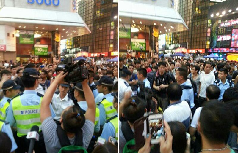 銅鑼灣有人攻擊崇光百貨對出的集會人士。（照片由現場人士提供）