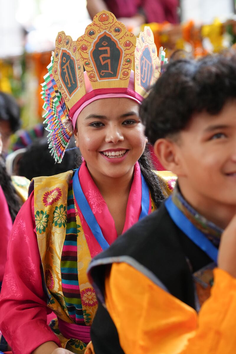 A devotee listens during celebrations for the 90th birthday of the Dalai Lama at the Main Temple in Dharamsala, India, July 6, 2025.